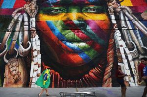 A mural by Eduardo Kobra depicting an indigenous Brazilian. Photograph: Mario Tama/Getty Images