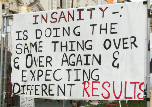 insanity_occupy_sign